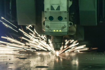 Fibre laser burning of material